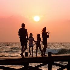 family on pier