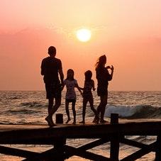 family on pier